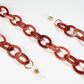 chain for glasses red plastic elipse